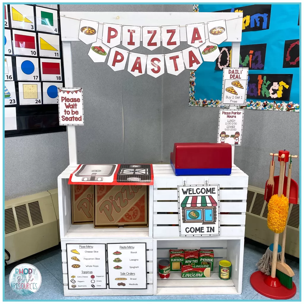 Pizza parlor dramatic play in kindergarten setup.